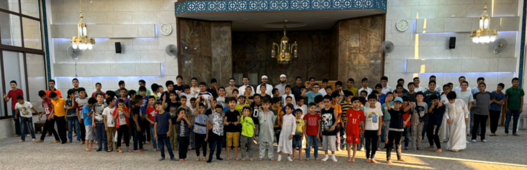 Video thumbnail showing children in the Halaqa